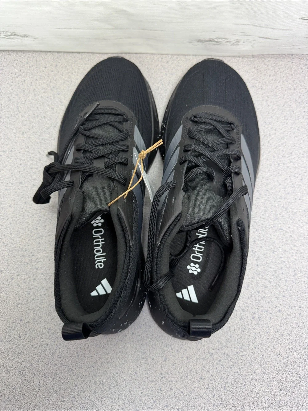 adidas Men's Black Athletic Shoes with Silver Stripes